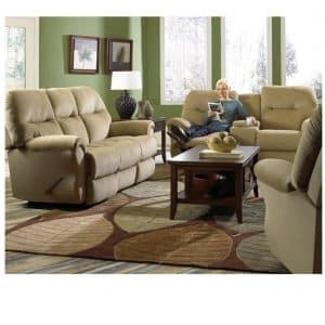 bodie recliner sofa in room setting with person reclined in love seat