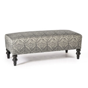 custom upholstery on the ryker ottoman with turned legs